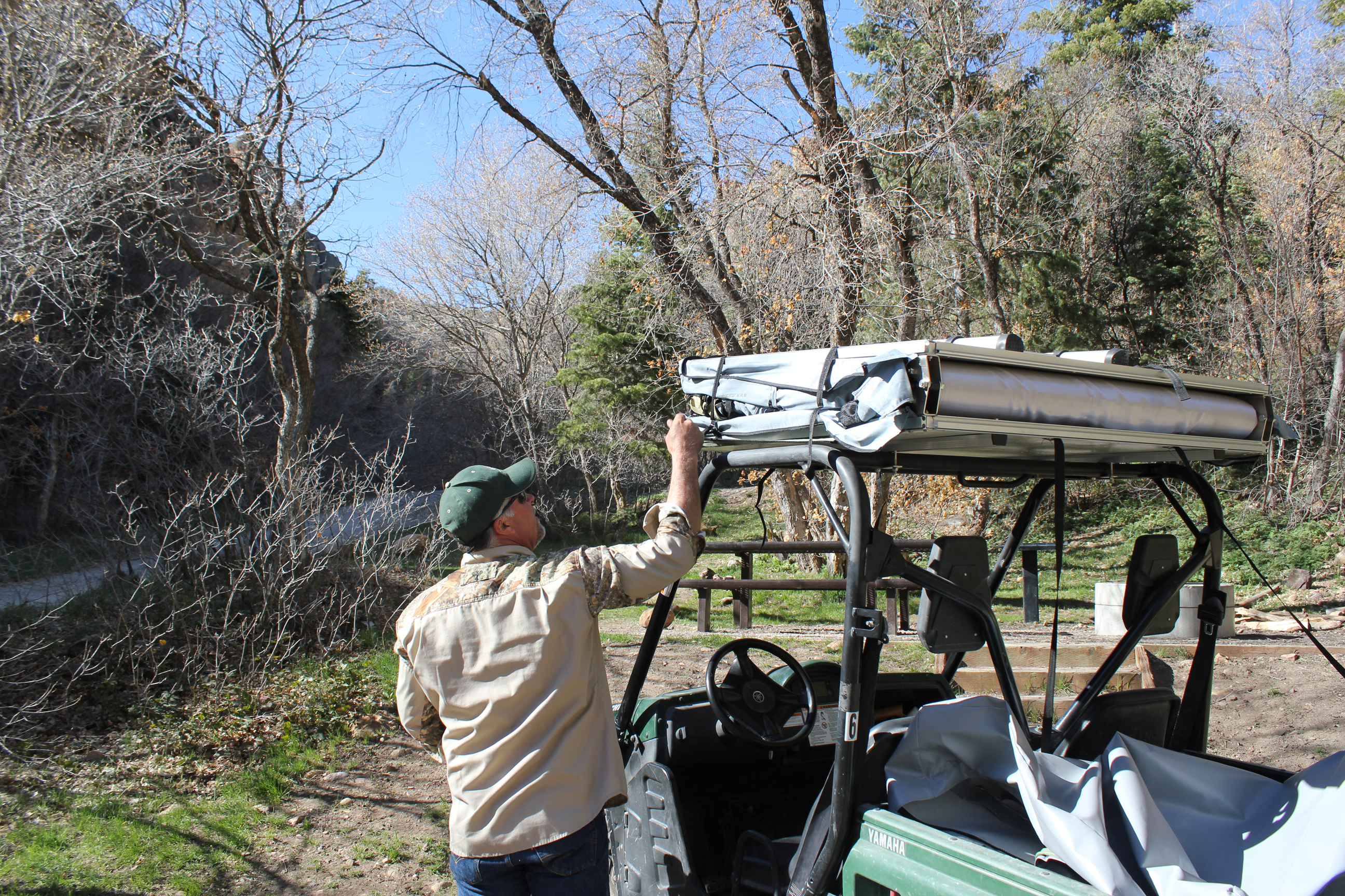 Undo the tie down straps from your UTV Tent